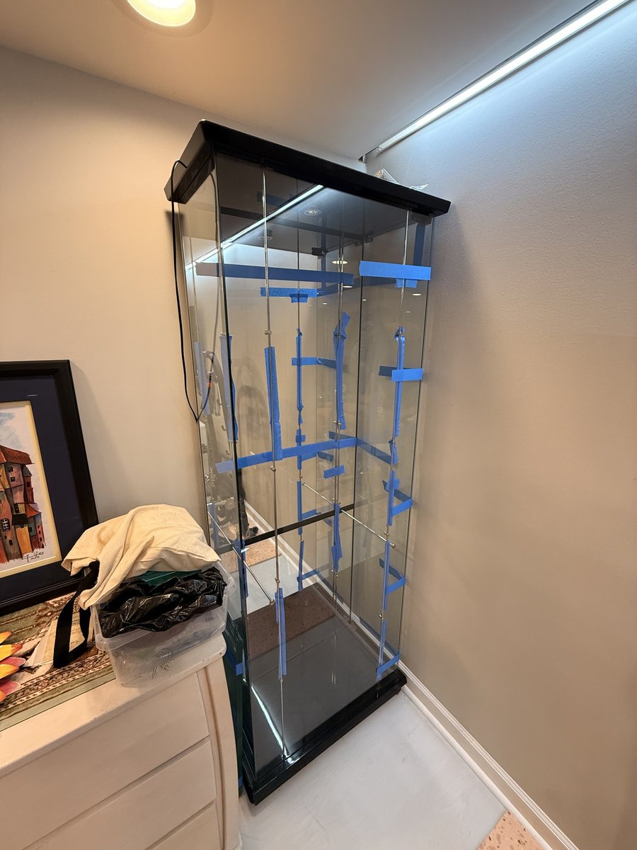 Illuminated glass curio cabinet A